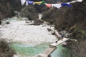 Bhutan-Laya-Village-Himalayas-Mountain-Trek-bridge-crossing-prayer-flags-500